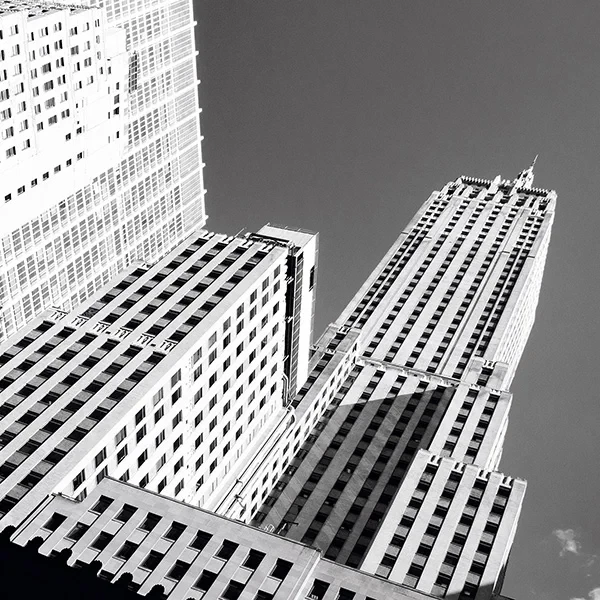 Distorted skyline, artistic street photography, architecture in motion.