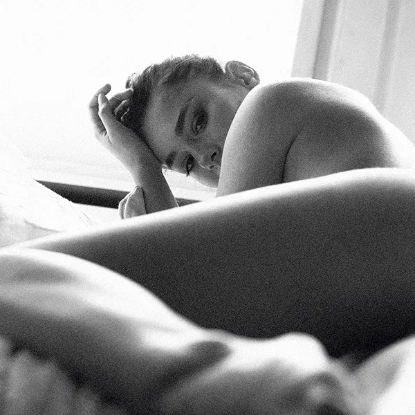 WRAPPED IN REFLECTION